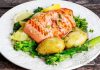Salmon served with broccoli and potatoes